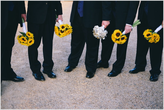 jason keefer photography keswick vineyards wedding charlottesville virginia sunflowers groomsmen holding bouquet